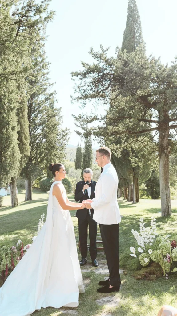 A bride and groom being married by the celebrant and Wedding MC Attilio Reinhardt in Umbria, Italy